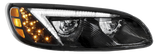 Car headlight with clear lens and amber LED indicators