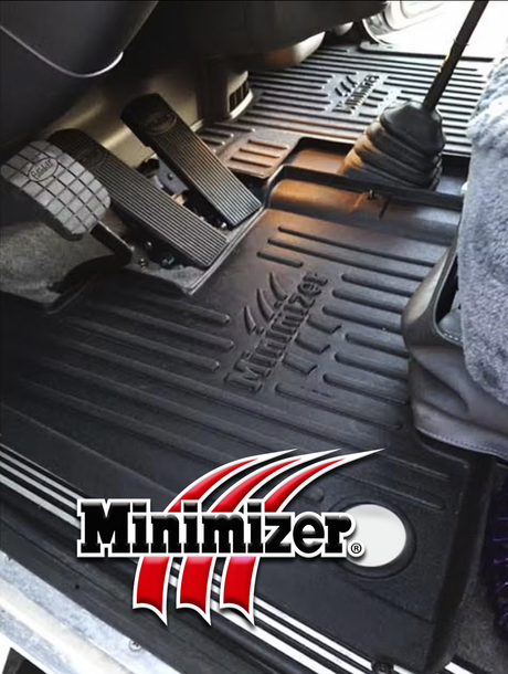 truck interior with Minimizer floor mats and logo